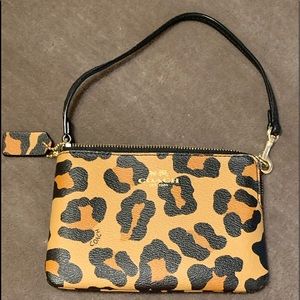 Coach Ocelot wristlet never used